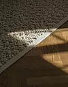 Gravel tepih by Nina Bruun za Audo Copenhagen u boji slonovače