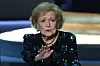 (FILES) In this file photo taken on September 17, 2018 Betty White si speaking onstage during the 70th Emmy Awards at the Microsoft Theatre in Los Angeles, California. - Actress Betty White, who made US television audiences laugh for more than seven decades, starring on popular sitcoms ”The Golden Girls” and ”The Mary Tyler Moore Show,” has died on December 2021, at 99. (Photo by Robyn BECK/AFP)