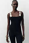 Zara pleteni top s cvijećem (19,95 eura)