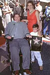 Holivudski glumac sa suprugom i sinom Willom 1997., kada je dobio zvijezdu na holivudskom Šetalištu slavnih