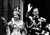 File photo dated 02/06/1953 of Queen Elizabeth II wearing the Imperial State Crown, and the Duke of Edinburgh, in the uniform of Admiral of the Fleet, waving from the balcony of Buckingham Palace after the Queen's Coronation. The Royal couple will celebrate their platinum wedding anniversary on November 20., Image: 355690164, License: Rights-managed, Restrictions: FILE PHOTO, Model Release: no, Credit line: PA Wire / PA Images / Profimedia