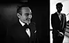 LONDON, ENGLAND - DECEMBER 04: (EDITORS NOTE: Image has been converted to black and white.) John Galliano is seen backstage during The Fashion Awards 2017 in partnership with Swarovski at Royal Albert Hall on December 4, 2017 in London, England. (Photo by Gareth Cattermole/BFC/Getty Images)