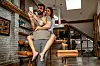 Shot of an attractive young couple looking at a mobile phone