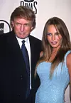 FILE PHOTO: Donald Trump and Melanie Knaus arrive for VH1's Divas Live concert at the Beacon Theater in New York City April 13, 1999. (Photo by Diane Freed)