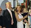 HOLLYWOOD, CA - JANIUARY 16: Donald Trump (L) , wife Melania (C) and son Baron attend the ceremony honoring him with a star on the Hollywood Walk of Fame on January 16, 2006 in Hollywood, California. (Photo by Vince Bucci/Getty Images)
