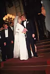 American businessman Donald Trump kisses his new bride Marla Maples following their wedding ceremony at Trump Plaza hotel, New York City, December 19, 1993. (Photo by Hulton Archive/Getty Images)