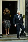 LONDON, UNITED KINGDOM - MAY 14: Britain's Prime Minister Boris Johnson and his partner Carrie Symonds stand outside the door of number 10 Downing Street as they thank the key workers who are working during the current lockdown on May 14, 2020 in London, United Kingdom. Following the success of the