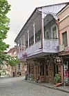 Old house with a big wooden balcony in the mostly renovated historical old town Sighnaghi (Signagi) in Georgia (Kakheti), recorded on 21.05.2019 | usage worldwide