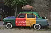 Advertising for the Wine Museum in the city of Sighnaghi (Signagi) in Georgia (Kakheti) on a discarded vintage Soviet car - the region is known for traditional wine growing, recorded on 21.05.2019 | usage worldwide