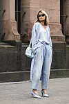 DUESSELDORF, GERMANY - MARCH 19: Influencer Gitta Banko, wearing a jeans by Magda Butrym, a pastel blue pullover and a pastel blue cardigan by t7berlin, a topaz colored padded cassette bag by Bottega Veneta, topaz colored crunch sharpei pumps by Bottega Veneta and sunglasses by Saint Laurent during a street style shooting on March 19, 2020 in Duesseldorf, Germany. (Photo by Isa Foltin/Getty Images)