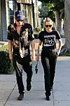 ** PREMIUM EXCLUSIVE RATES APPLY ** Pop star couple Miley Cyrus and Cody Simpson enjoy a stroll in the sun, window shopping for furniture in West Hollywood. Miley rocked a Ramones shirt while Cody is seen in a tiger print shirt. 24 Feb 2020,Image: 500957726, License: Rights-managed, Restrictions: World Rights, Model Release: no, Credit line: Rachpoot/MEGA / The Mega Agency / Profimedia