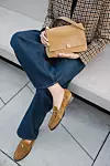 Look je upotpunila Tory Burch torbicom (599 eura) i Tory Burch mokasinkama (399 eura) te odabranim komadima nakita: Tory Burch narukvicom (180 eura) i Marc Jacobs naušnicama (130 eura)
