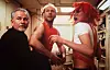 Glumci Ian Holm, Bruce Willis i Milla Jovovich u 'Petom elementu'