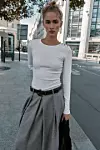 Zara rebrasta majica s gumbima (prije 12,95 eura, sada 7,77 eura)