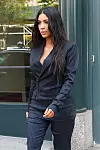 New York, NY - Kim Kardashian displays some cleavage in a plunging navy blue pinstripe suit while out in NY. Pictured: Kim Kardashian *UK Clients - Pictures Containing Children Please Pixelate Face Prior To Publication*, Image: 337662146, License: Rights-managed, Restrictions: , Model Release: no, Credit line: JosiahW / BACKGRID / Backgrid USA / Profimedia