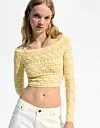 Bershka pleteni top (25,99 eura)