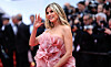 German model Heidi Klum arrives for the Opening Ceremony and the screening of the film ”Partir un Jour” (Bye Bye) presented out of competition at the 78th edition of the Cannes Film Festival in Cannes, southern France, on May 13, 2025. (Photo by Valery HACHE/AFP)