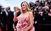 German model Heidi Klum arrives for the Opening Ceremony and the screening of the film ”Partir un Jour” (Bye Bye) presented out of competition at the 78th edition of the Cannes Film Festival in Cannes, southern France, on May 13, 2025. (Photo by Valery HACHE/AFP)