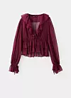 Lepršava bluza s volančićima - prije 29,99 eura, sada 19,99 eura