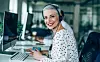 Smiling beautiful businesswoman working in call center