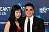 MOUNTAIN VIEW, CALIFORNIA - NOVEMBER 03: A guest and Eric Yuan (R) attend the 2020 Breakthrough Prize Red Carpet at NASA Ames Research Center on November 03, 2019 in Mountain View, California. (Photo by Ian Tuttle/Getty Images for Breakthrough Prize )