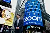 NEW YORK, NY - APRIL 18: Zoom founder Eric Yuan poses in front of the Nasdaq building as the screen shows the logo of the video-conferencing software company Zoom after the opening bell ceremony on April 18, 2019 in New York City. The video-conferencing software company announced it's IPO priced at per share, at an estimated value of .2 billion. (Photo by Kena Betancur/Getty Images)