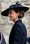 S druge strane, princeza Kate uhvaćena je u srdačnom razgovoru u kojem nije susprezala osmijeh