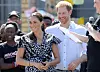 CAPE TOWN, SOUTH AFRICA - SEPTEMBER 23: Meghan, Duchess of Sussex and Prince Harry, Duke of Sussex smile as they visit a Justice Desk initiative in Nyanga township, during their royal tour of South Africa on September 23, 2019 in Cape Town, South Africa. The Justice Desk initiative teaches children about their rights and provides self-defence classes and female empowerment training to young girls in the community. (Photo by Chris Jackson/Getty Images)
