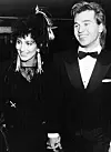 Singer Cher and actor Val Kilmer attending the BAFTA Awards hand in hand, London, March 25th 1984. (Photo by Dave Hogan/Getty Images)
