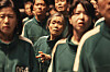 SQUID GAME, KANG Ae-sim (center), (Season 2, ep. 203, aired Dec. 26, 2024). photo: NO Ju-han/?Netflix/Courtesy Everett Collection