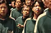 SQUID GAME, KANG Ae-sim (center), (Season 2, ep. 203, aired Dec. 26, 2024). photo: NO Ju-han/?Netflix/Courtesy Everett Collection