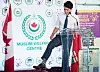 Prime Minister Justin Trudeau shows of his Ramadan color socks after helping prepare food baskets for Project Ramadan at the Muslim Welfare Centre in Scarborough, Ont., on Thursday, June 22, 2017.,Image: 338814586, License: Rights-managed, Restrictions: World rights excluding North America, Model Release: no
