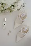 Mladenka je nosila Jimmy Choo Bing 65 sandale i Chanel naušnice