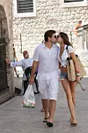 Dubrovnik 140712. Na vikend u Dubrovnik stigli su Ivan Todoric i njegova dugogodisnja djevojka Milica Mihajlovic. Stigli su kasno sinoc, a jutos su se spustili do Straduna popiti kavu. Na slici je mladi par na putu od Straduna prema kuci, ispred dominikanskog samostana. Obitelj Todoric posjeduje kucu u Dubrovniku. Foto: Sinisa Sunara / Cropix