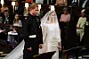 WINDSOR, UNITED KINGDOM - MAY 19: Prince Harry and Meghan Markle stand together in St George's Chapel at Windsor Castle for their wedding on May 19, 2018 in Windsor, England. (Photo by Dominic Lipinski - WPA Pool/Getty Images)