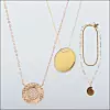 Srebrna ogrlica u boji rose zlata 45 eura (Oxette) Zlatna ogrlica s medaljonom - 2050 kn (Zaks) Dvostruka ogrlica s privjeskom - 139,90 kn (Zara)